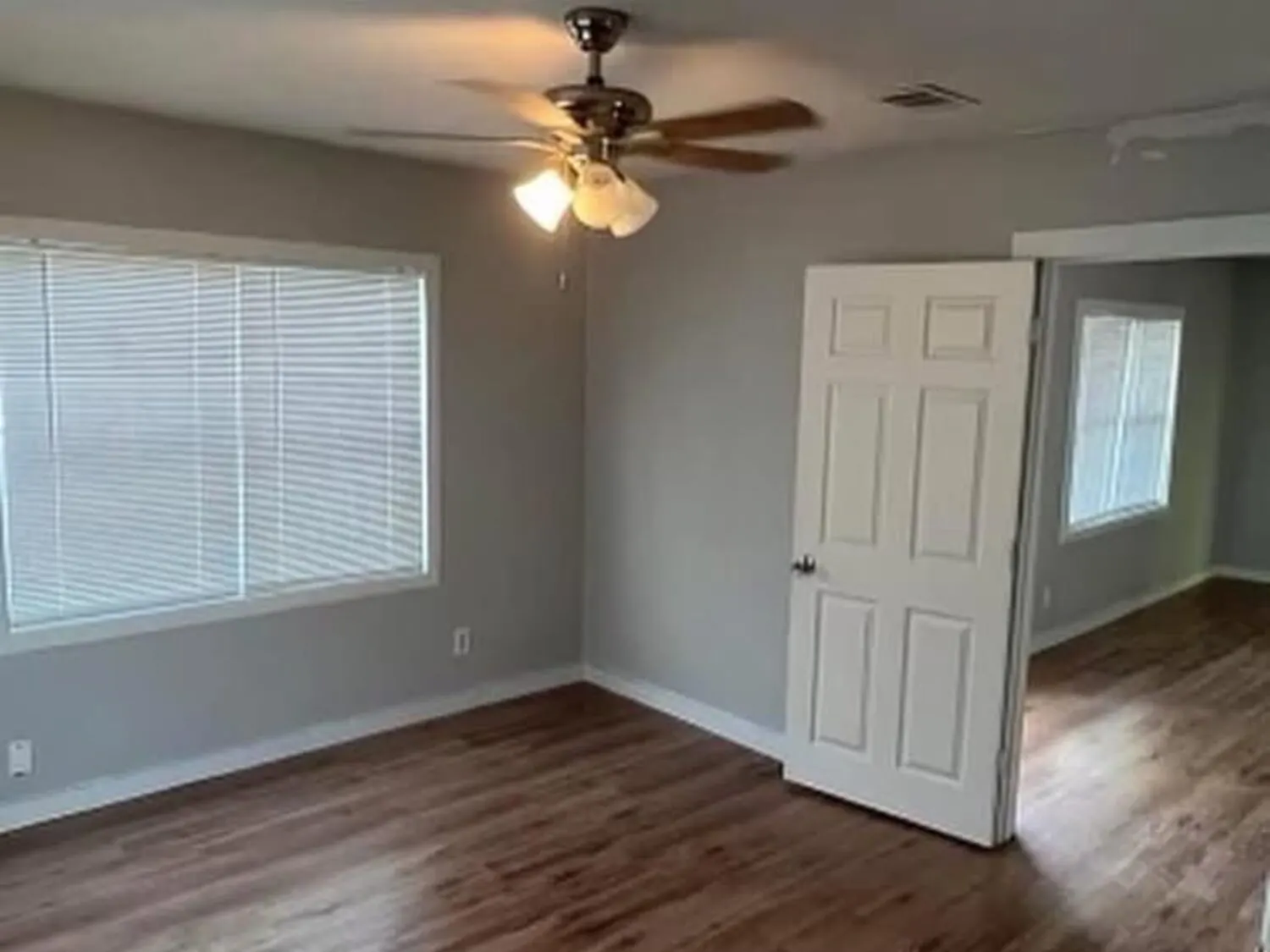 Duplex room after flooring and wall finish work