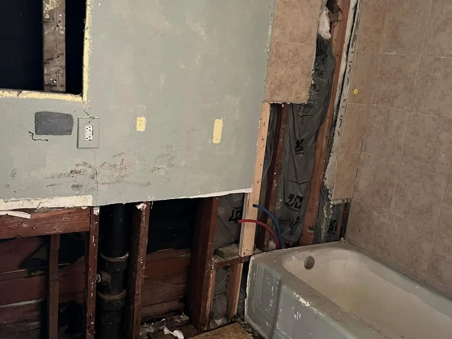 Duplex bathroom area during demo