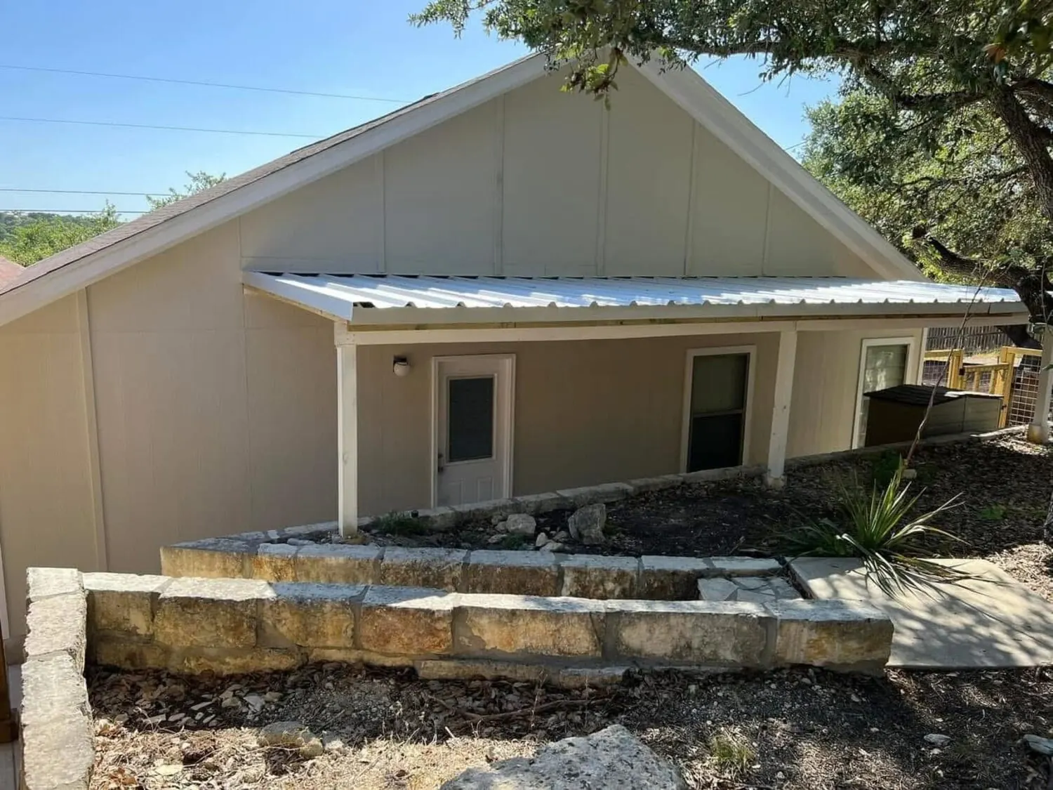 Home exterior after repaint near entry