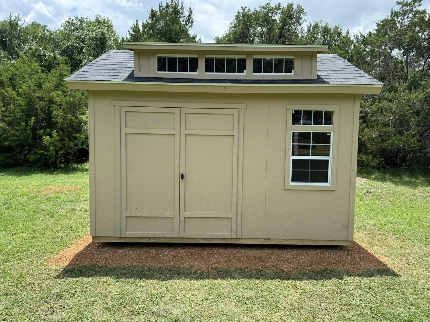 Finished tan storage shed